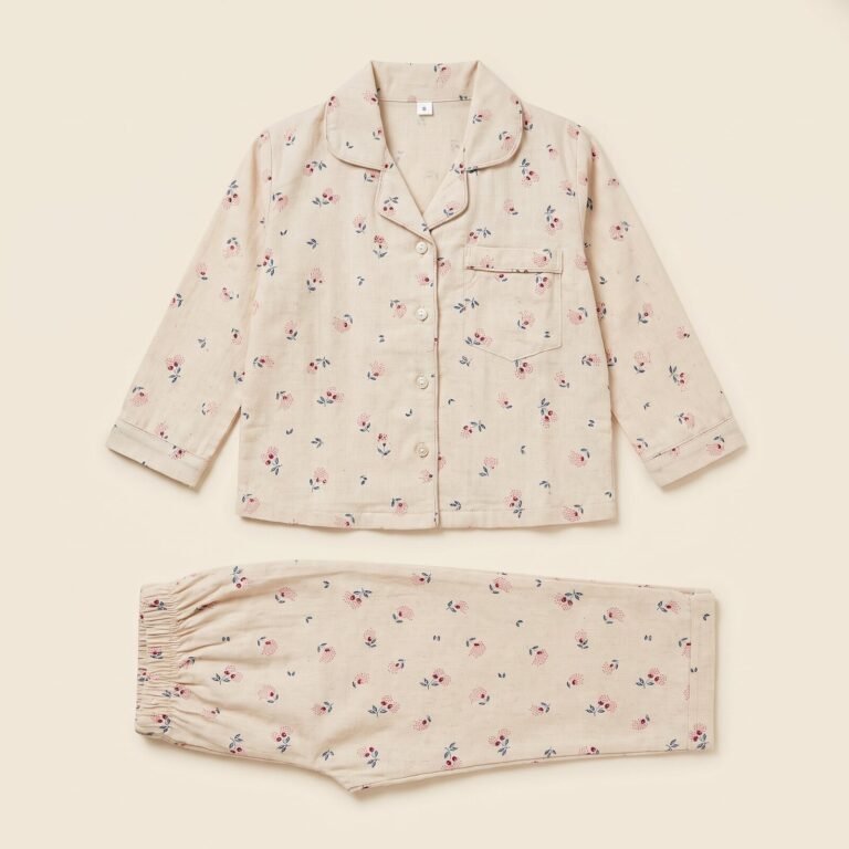 Little Rosebud pyjama set laid flat, top and trousers